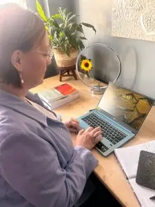 Dr Alison Working on Laptop